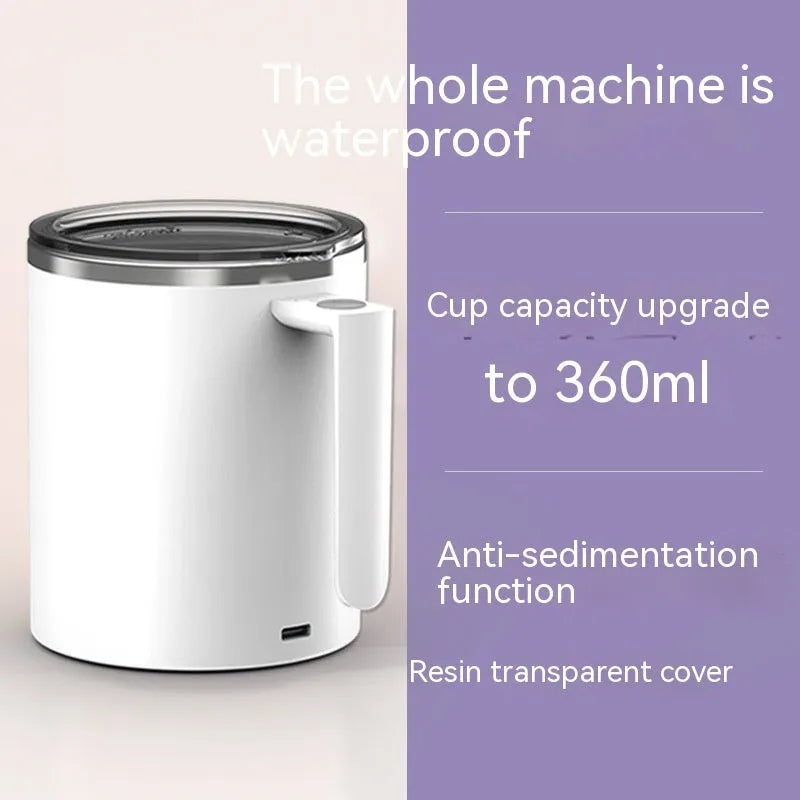 White automatic stirring coffee cup with magnetic base on a wooden table, showing simple solid-colour design.