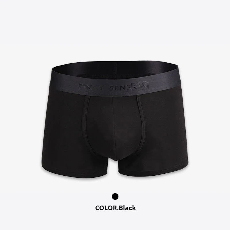 Men's solid colour cotton underwear boxer in black on white background