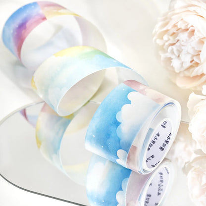 Japanese paper washi tape roll with sky theme decoration, 30mm width, showing colourful clouds pattern