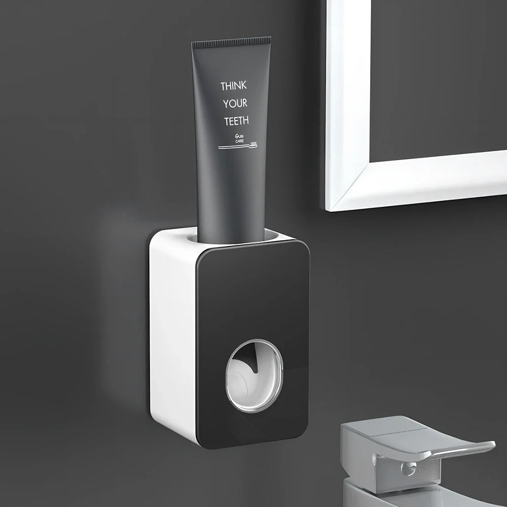 Black wall-mounted automatic toothpaste dispenser with 1 ml pump, punch-free adhesive, 18 cm height for bathroom use