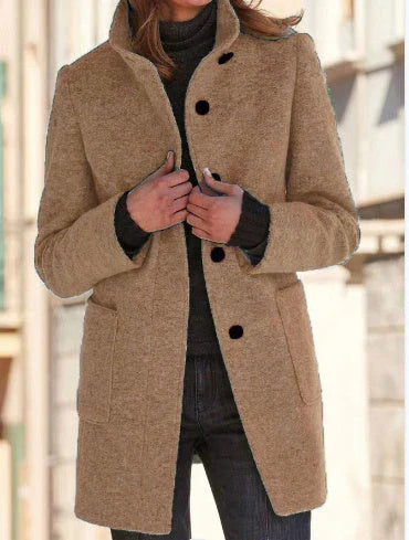 Stylish wool coat with stand collar, pockets, and slim fit design for casual winter wear.