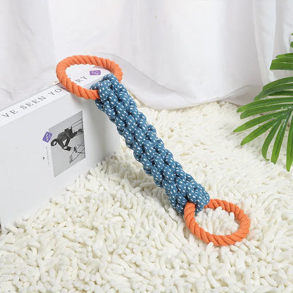 Blue braided bone-shaped cotton rope dog toy with two end rings on a white background.