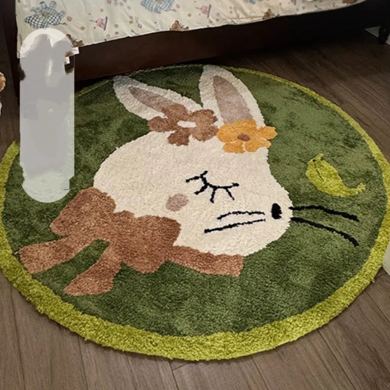 Round soft polyester children's floor carpet in forest green with anti-slip backing, shown beside a bed.