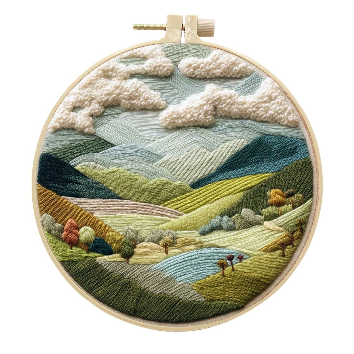Complete DIY embroidery kit with 15cm bamboo frame, pre-printed landscape fabric, threads, and needles laid out.