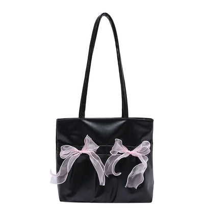 College style bow tote bag in black PU leather with double shoulder straps and bow detailing