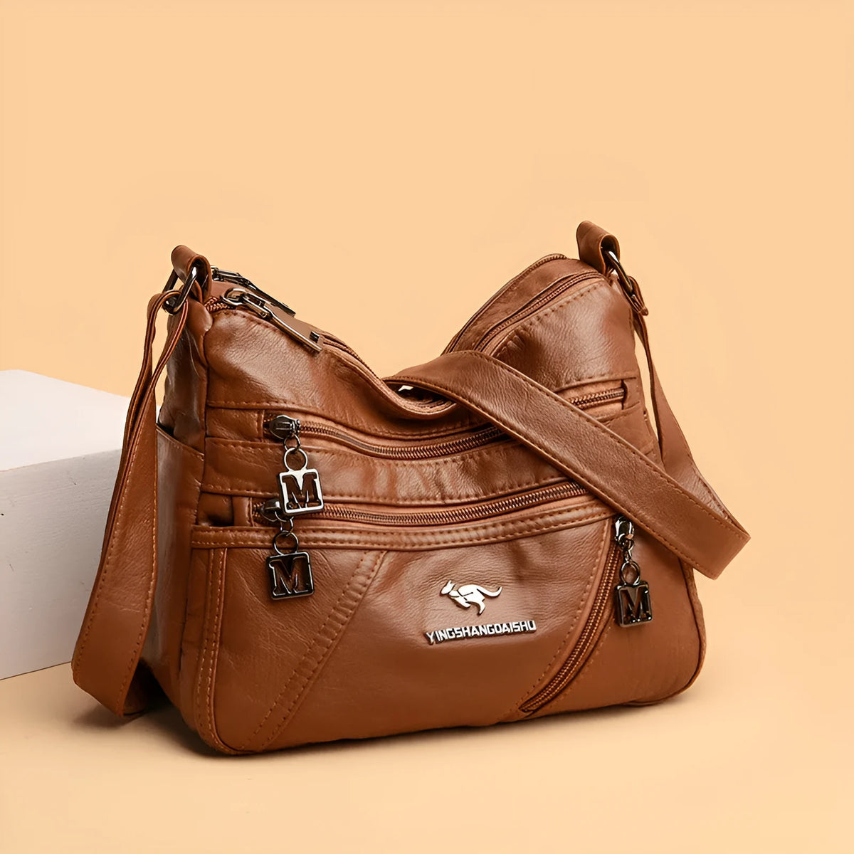 Middle-aged women's double layer PU shoulder bag with large capacity, welt pocket, and soft build in red, purple, dark blue, black, bronze, gray, or tan.