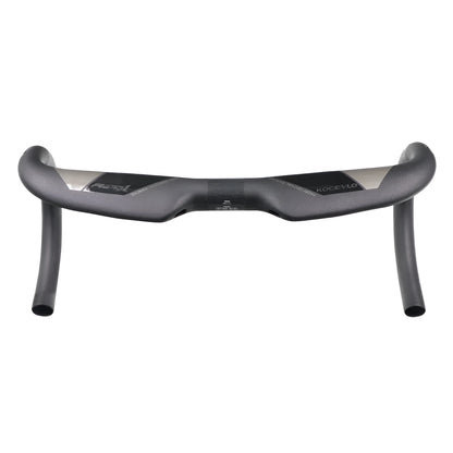 Matt carbon fibre road bike drop handlebar showing bent shape and clamp area.