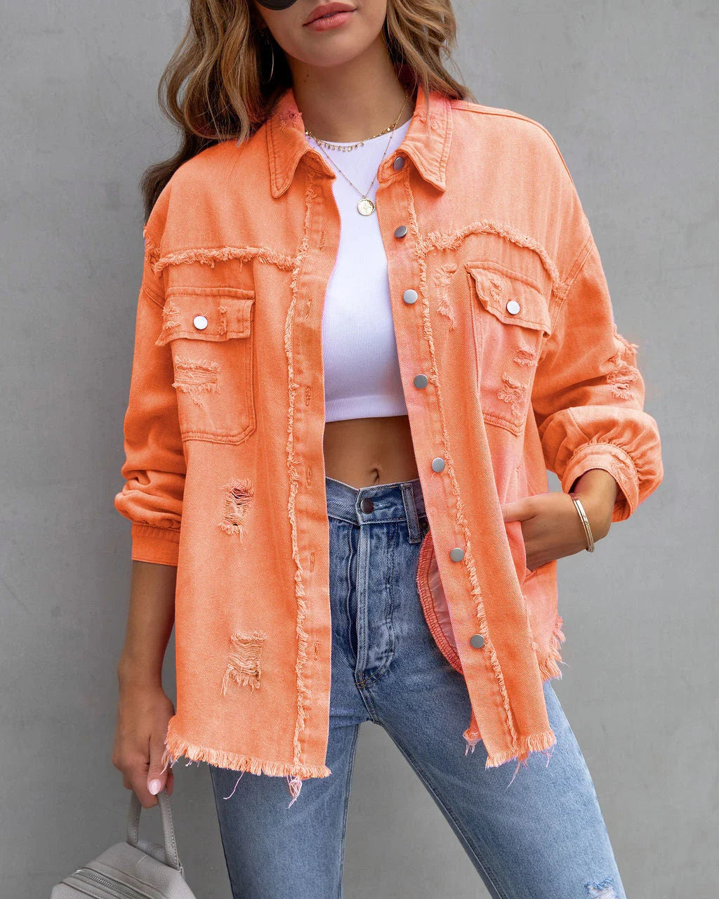 Stylish ripped denim jacket for trendy women in a variety of vibrant colors