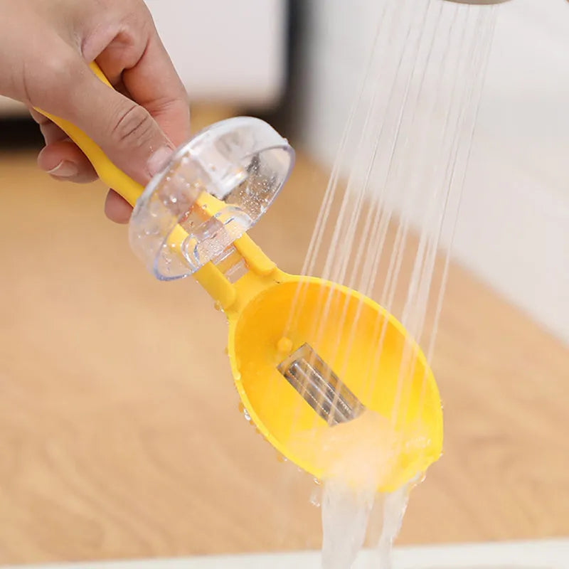 Yellow paring knife with a clear snap-on storage lid covering its stainless steel blade on a kitchen worktop.
