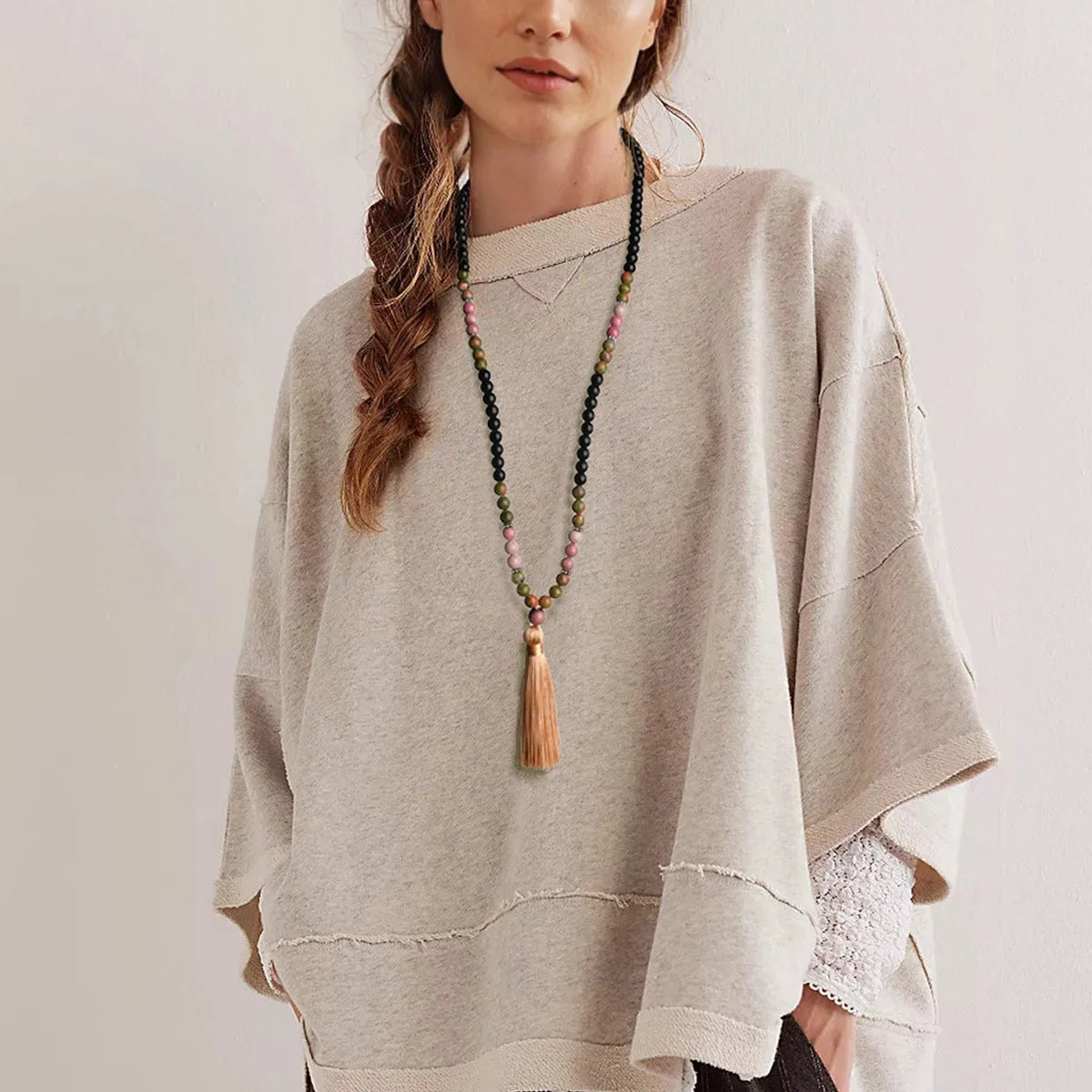Handmade long necklace with geometric gemstone pendant and tassel on a ball bead chain