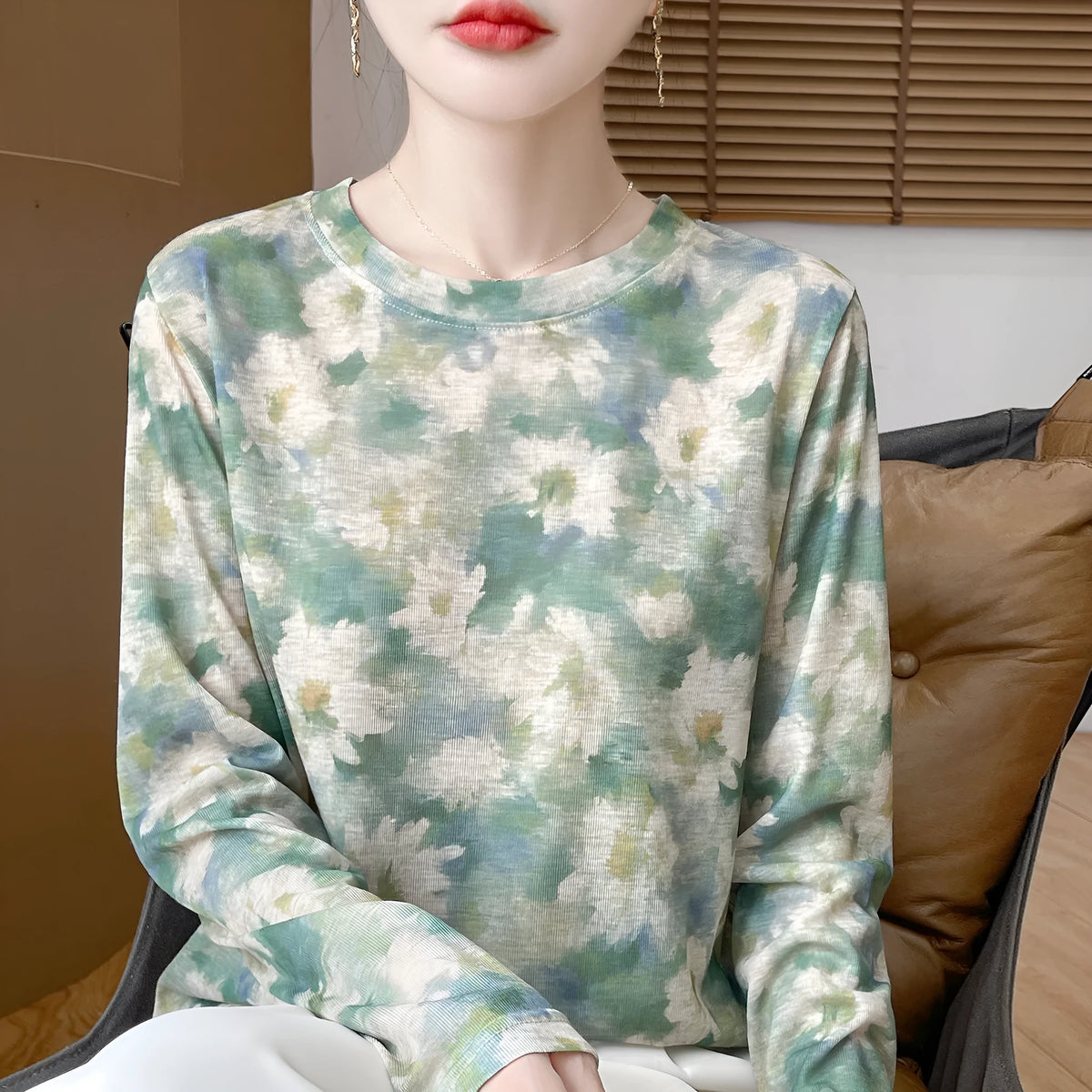 Women's round neck floral print pullover in Tencel cotton fabric, shown in a colourway from the range of five designs.