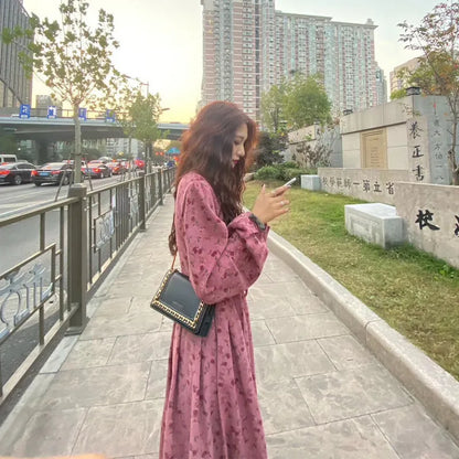 Red floral pattern knitted cotton dress with elastic waistband and princess sleeves in mid-length fairy dress style