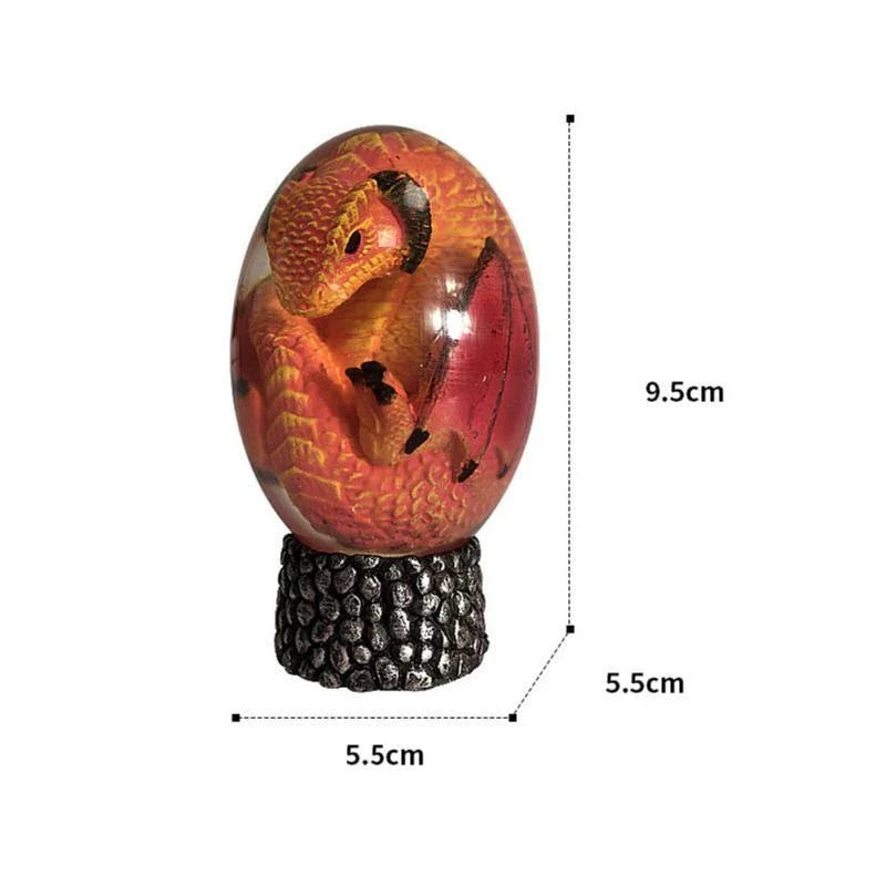 A lifelike resin dragon egg ornament with a crystal-clear, transparent design, sitting on a glowing lava-style base.