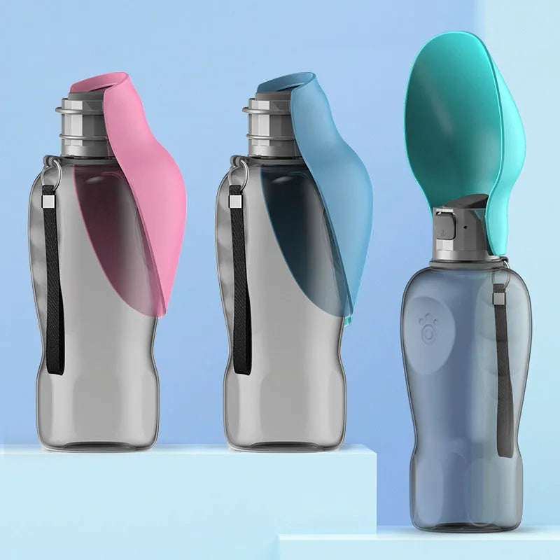 Blue grey portable dog water bottle with fold-out drinking bowl, shown with a wrist strap.