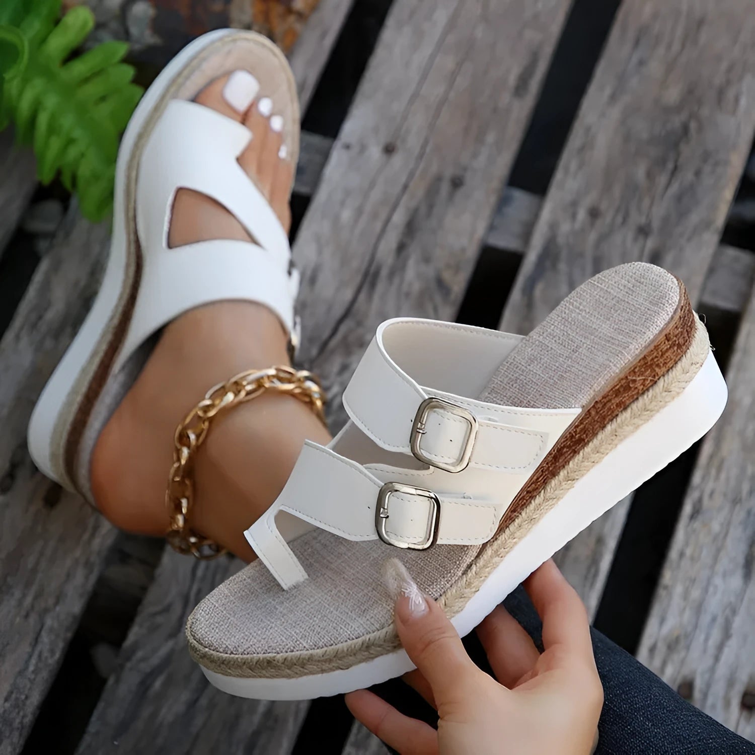 White patent leather wedge sandals with woven design and peep toe on rubber sole