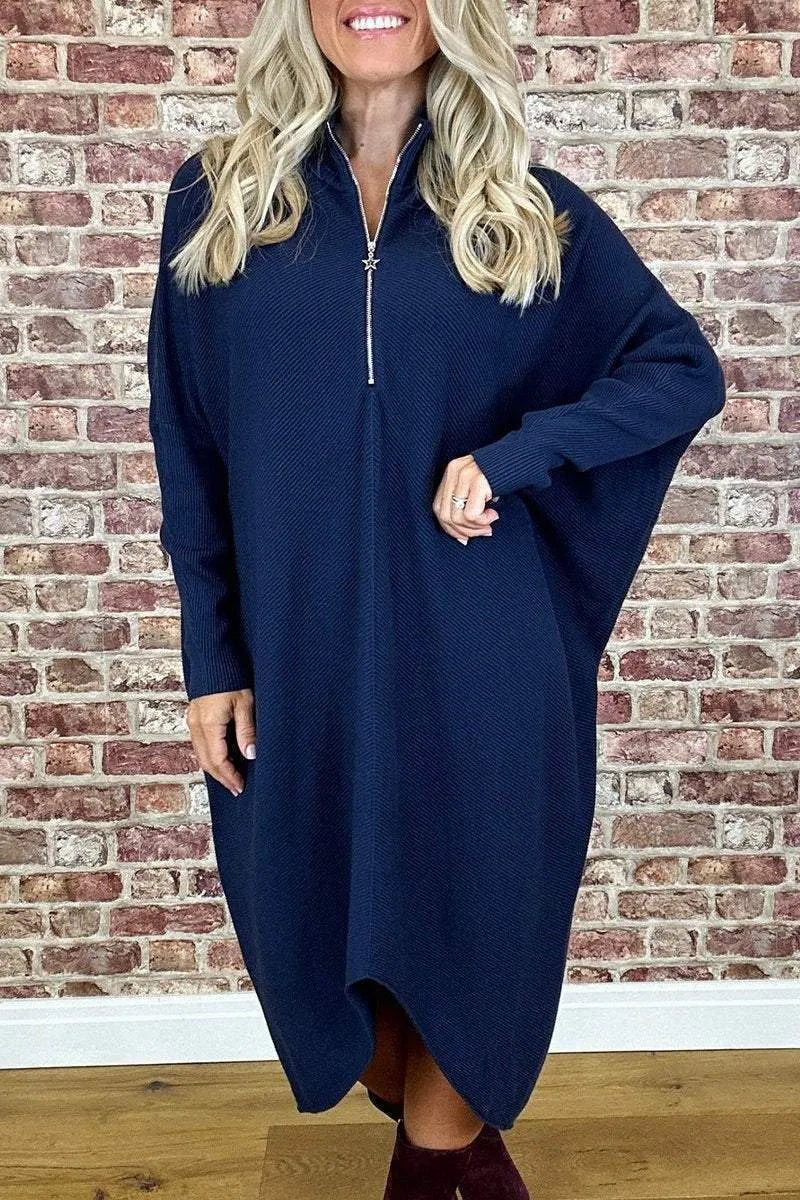 Women's solid colour loose knitted dress with a front zipper and raglan sleeves.