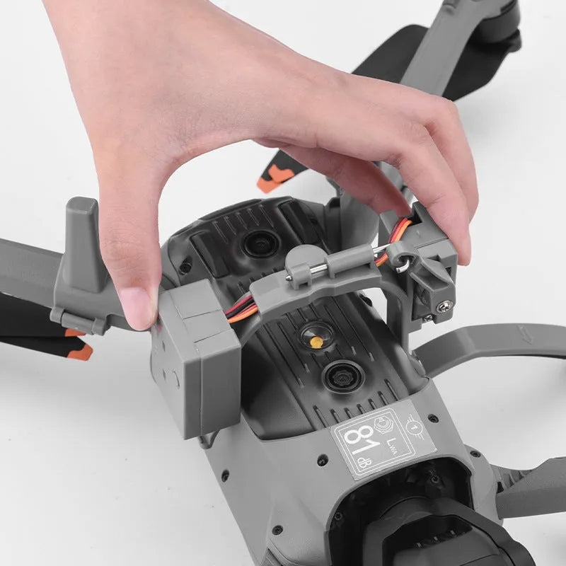 Dark grey ABS drone thrower for DJI Air 3 with USB charging and height extension tripod, 500g capacity.