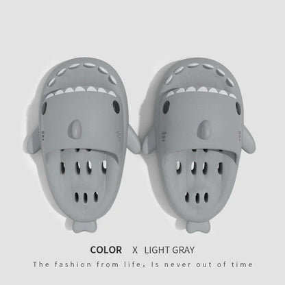 Stylish shark-themed shower slides with drainage holes and non-slip soles, made of lightweight and quick-drying EVA material
