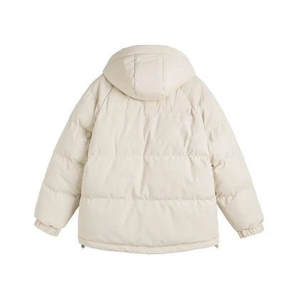 Loose winter cotton-padded coat in mustard yellow with side pockets and cardigan style
