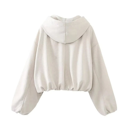 Women's casual hooded suede jacket in black colour on a hanger.