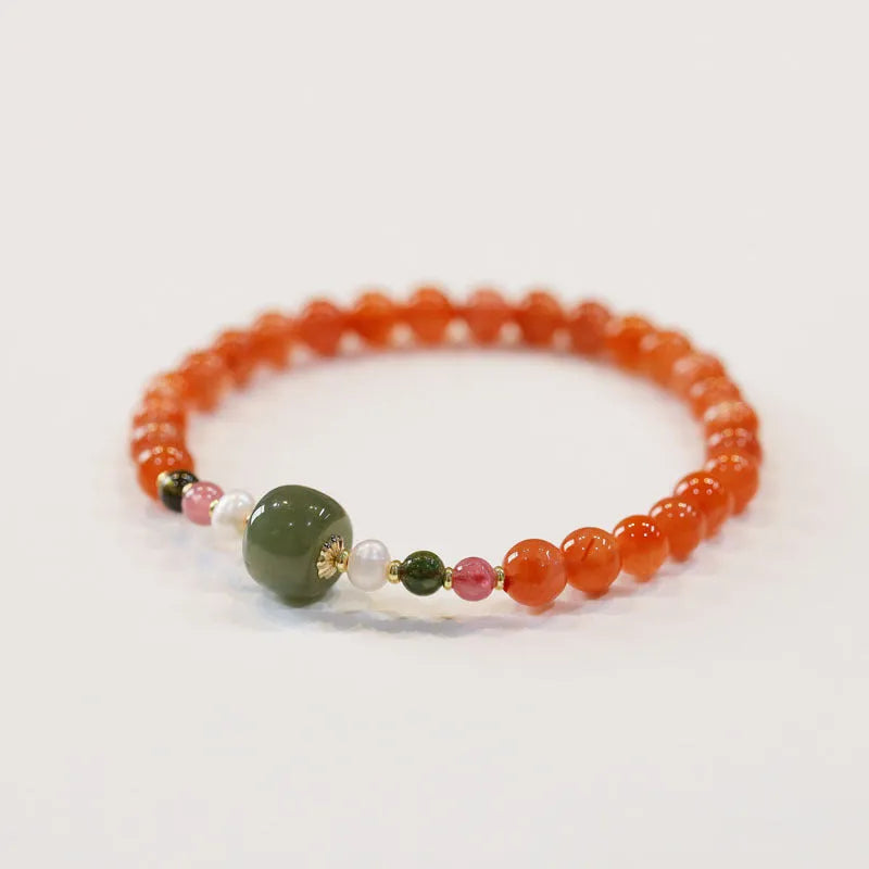Natural Sichuan cherry red South Red Agate round bead bracelet in retro ethnic style.