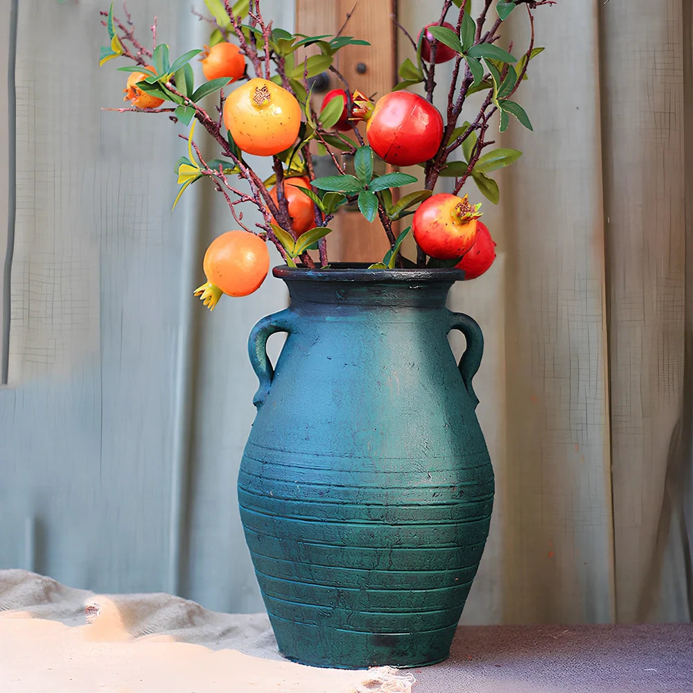 Ceramic mosaic vase with dried flower arrangement, handcrafted surface detailing