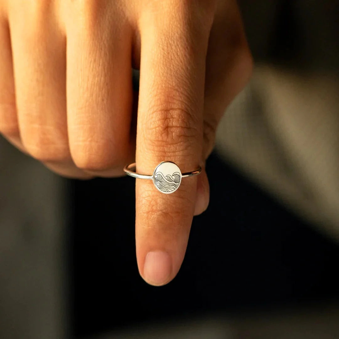 Sterling silver ring with elegant wave-inspired design, inspired by the natural beauty of the British coastline