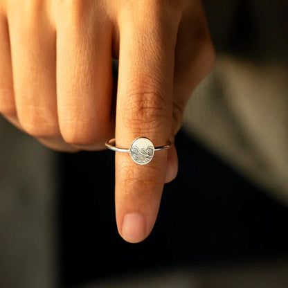 Sterling silver ring with elegant wave-inspired design, inspired by the natural beauty of the British coastline
