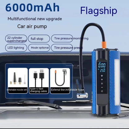 Black portable car tyre inflator with digital display, LED light, and connected air hose on a grey background