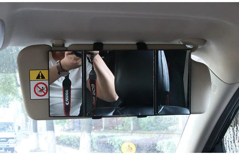 Silver car folding makeup mirror shown in opened position measuring 30.5cm wide