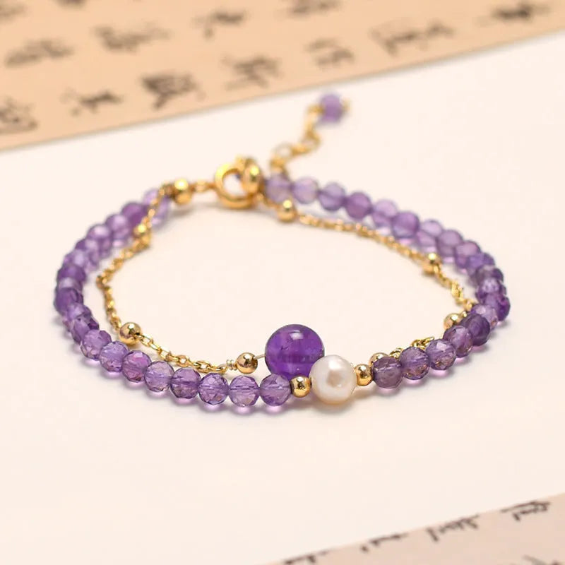 Amethyst coloured Chinese-style crystal bracelet with a diamond-shaped design and electroplated finish.