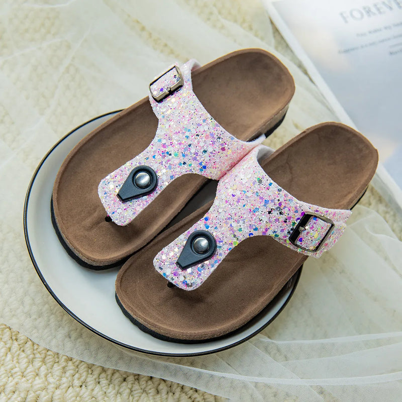 Cork flip-flops couples beach slippers with frosted PVC sole and breathable artificial leather upper in pink, silver, and gold colour options available in sizes 25 to 36 for youth clothing ages 7 to 16 years old