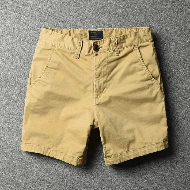 Men's pure cotton loose-fitting straight-leg shorts in a camouflage green colour.