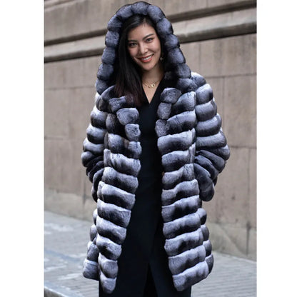 Women's zebra stripe pattern faux fur overcoat with regular sleeves, shown in a medium length.