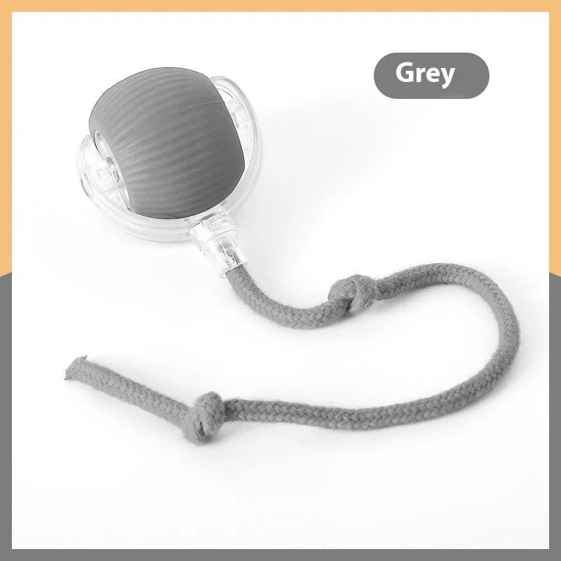 Interactive cat toy ball with automated features, rolling across various surfaces to engage and entertain your feline friend