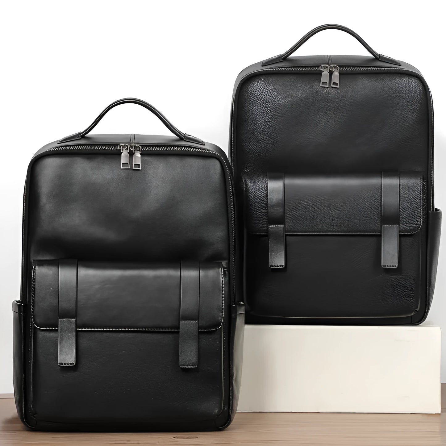 Men's large capacity leather computer backpack with curved back plate in black grain finish