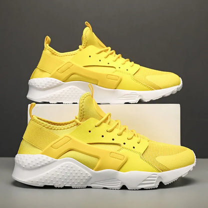 Men's low top casual shoes with mesh upper, cross shoulder straps, and flat heel in fluorescent colours