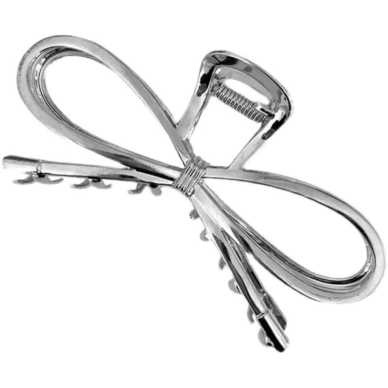 Alloy bow barrette hair grip in silver or gold colour for women's back-of-head styling