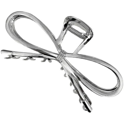 Alloy bow barrette hair grip in silver or gold colour for women's back-of-head styling