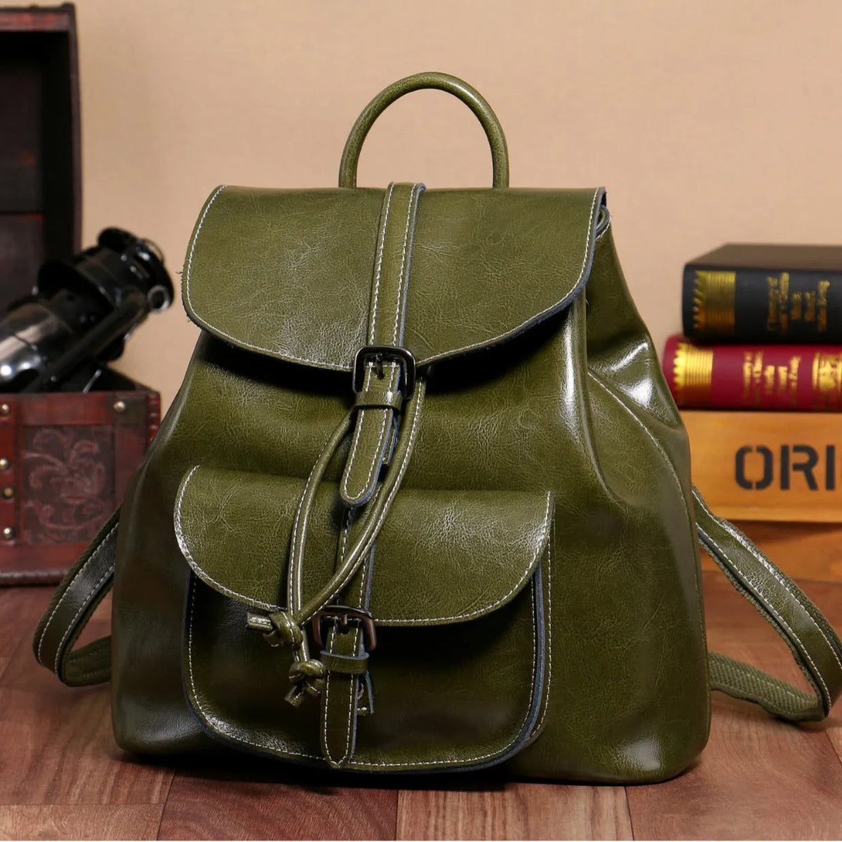Korean style cowhide leather backpack in black with front sandwich pockets and internal organisation compartments