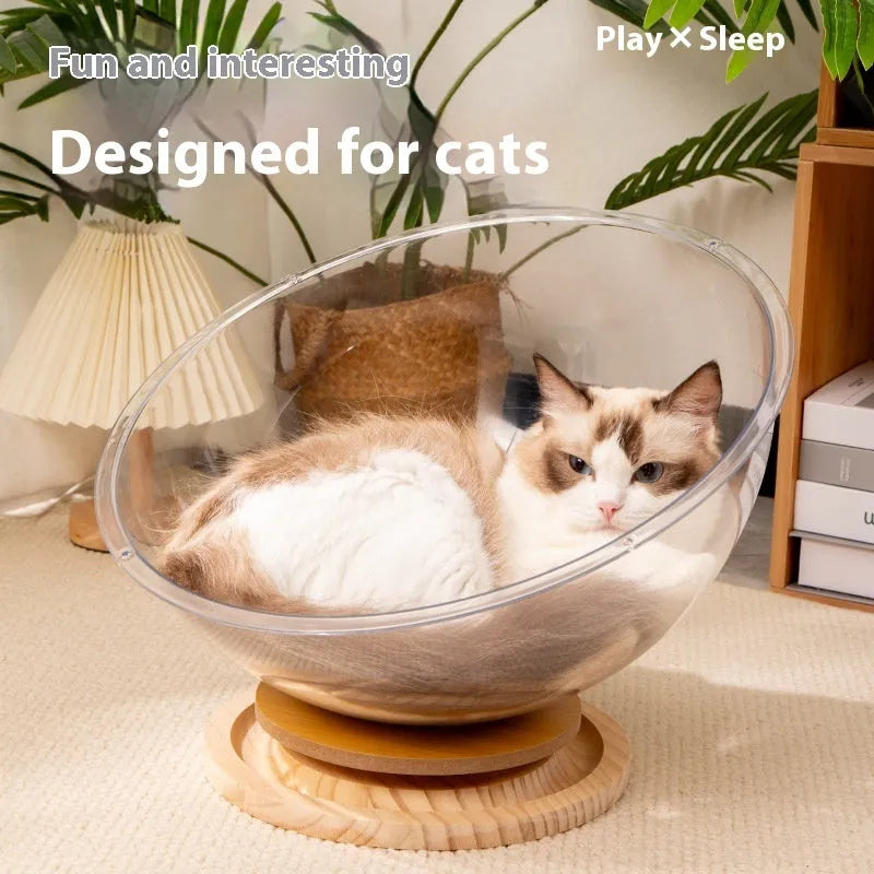 Transparent acrylic space capsule cat bed on a turntable base for cats.
