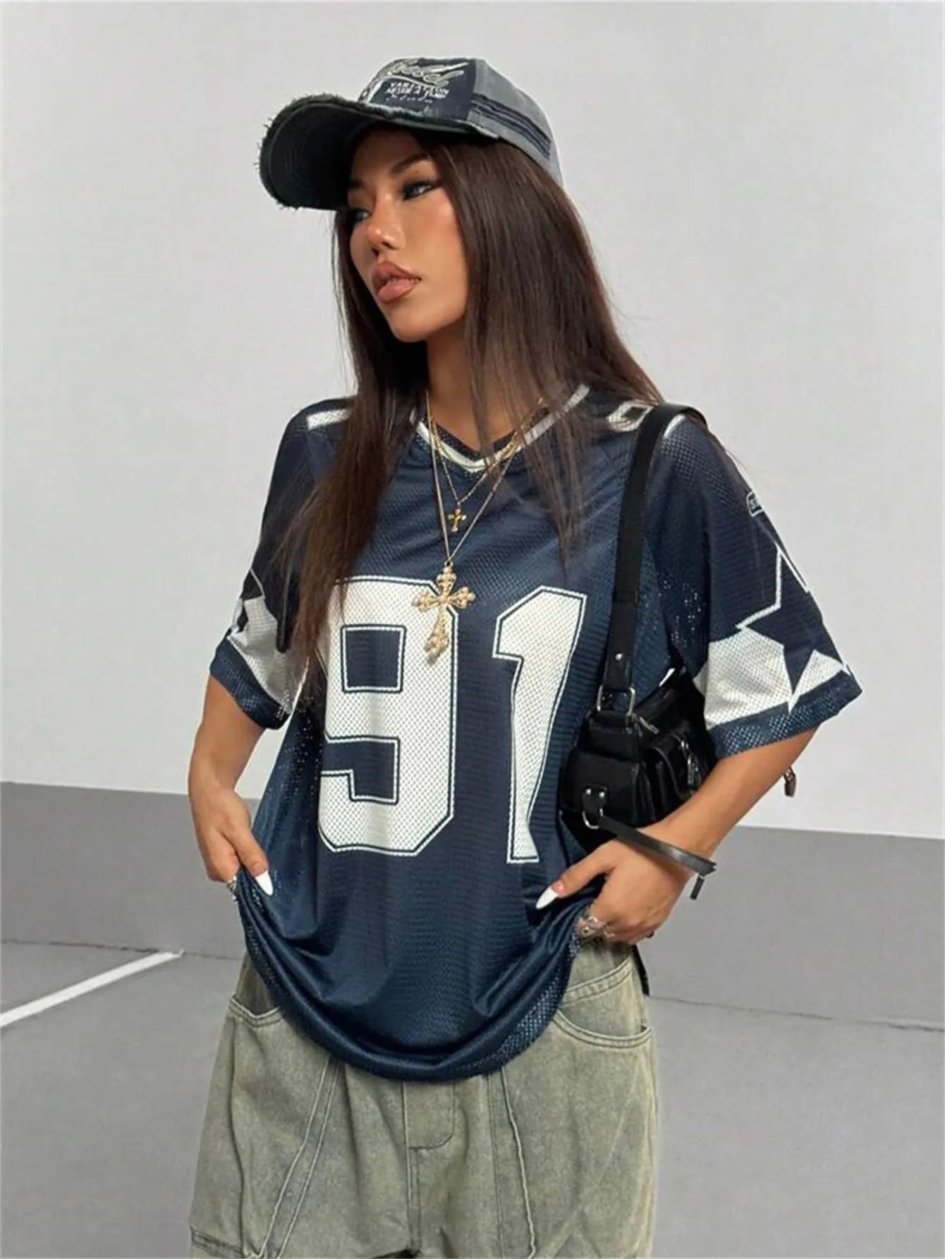 Men's large number printed V-neck loose t-shirt in streetwear style.