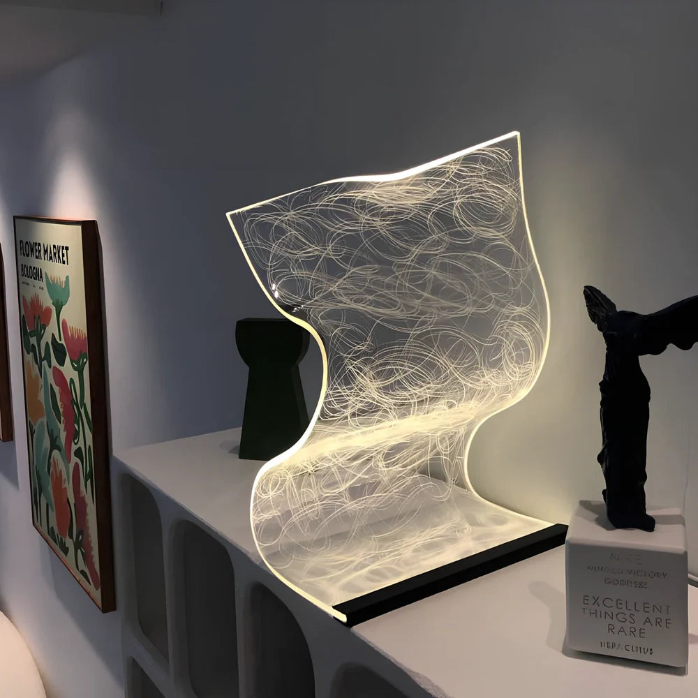 USB-powered bedside lamp with three colour settings and compact design