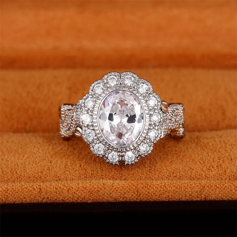 Round zircon ring with geometric design in F1770 white gold colour plating, available sizes 6 to 10