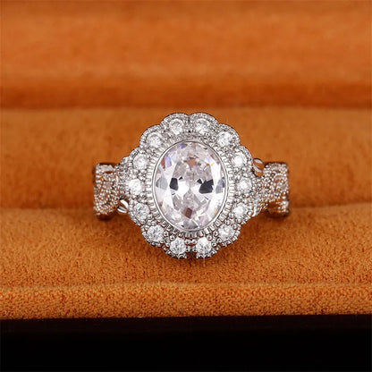 Round zircon ring with geometric design in F1770 white gold colour plating, available sizes 6 to 10