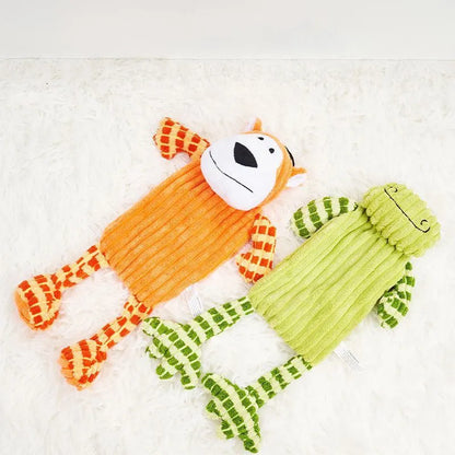 Green and orange immortal squeaker plush dog toy for aggressive chewers with dental cleaning surface