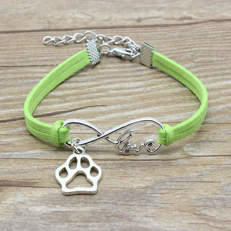 Stylish hand-woven infinite love pet bracelet in various colours, featuring a bow design and made of premium alloy materials