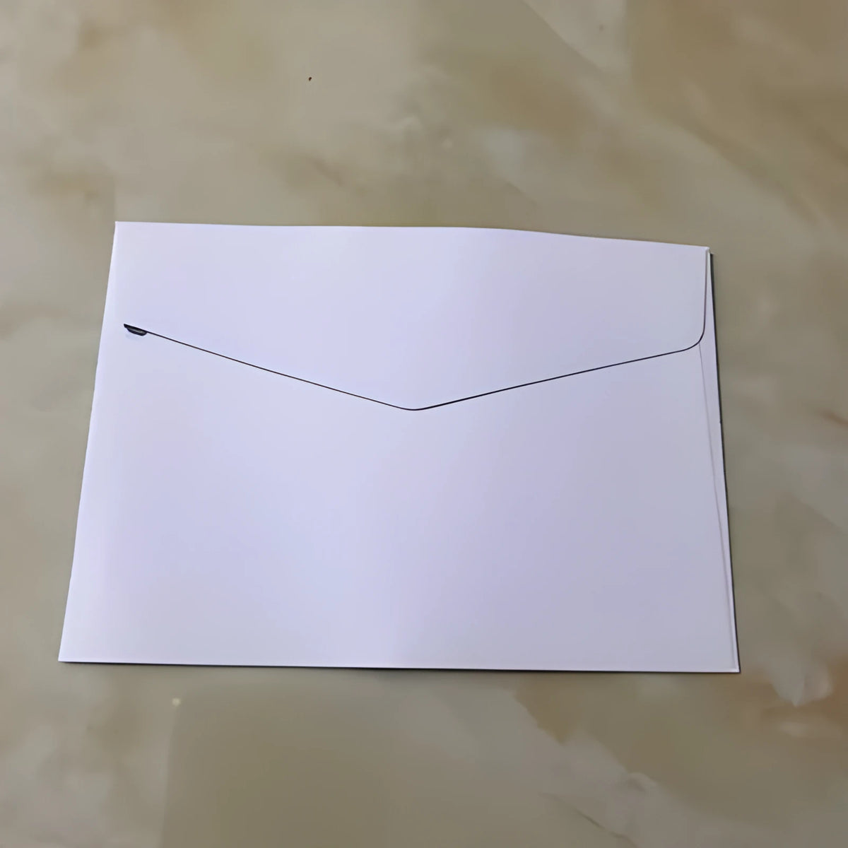 Mini coloured paper envelopes in various hues measuring 11.5 by 8 centimetres