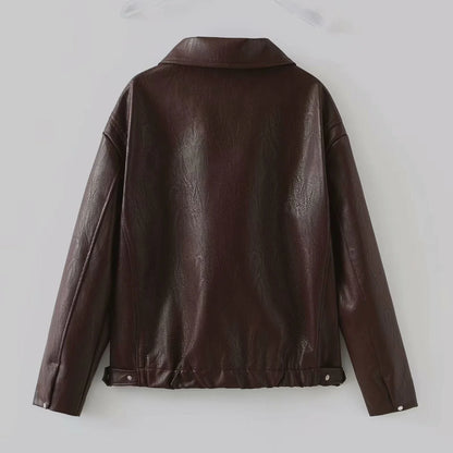 A stylish faux leather jacket with a zipper closure and lapel, available in burgundy and black colors.