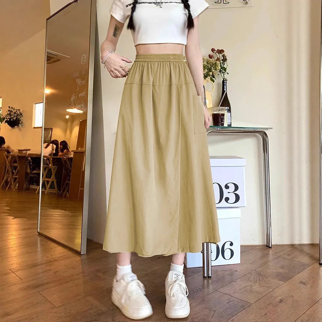 Women's camel coloured wide leg cropped skirt with elastic waistband and drape detailing